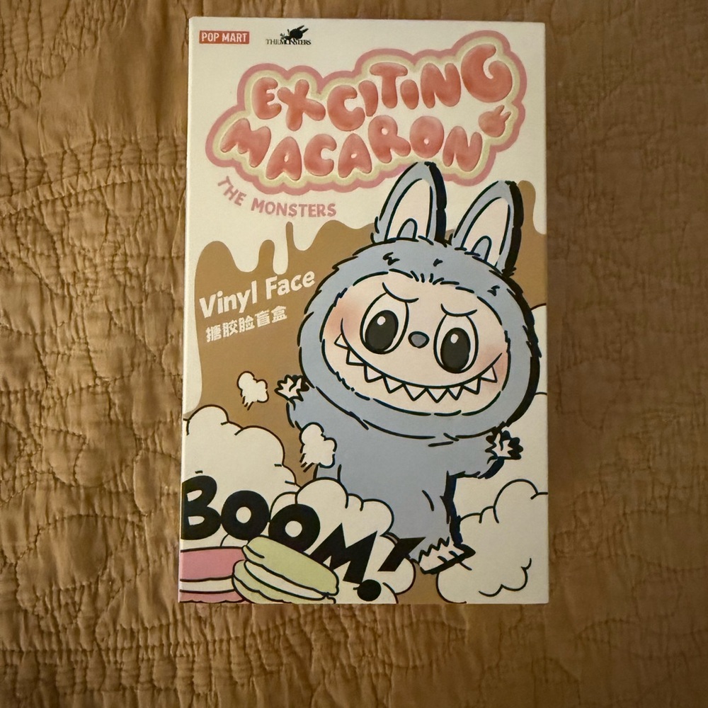 Exciting Macaron Vinyl Face Accessory. Sesame Bean. Unopened from PopNow.